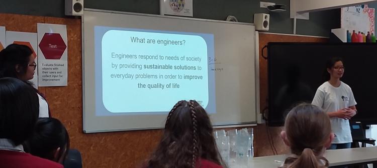 Engineers without borders presenting to students.