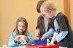 Children working together around a table